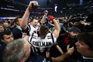 Tom Brady of the New England Patriots and Julian Edelman celebrate their team's 13-3 win over the Los Angeles Rams during Super Bowl LIII